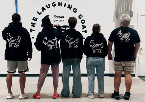 Rooted in people group photo of goat family